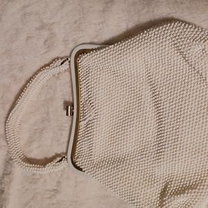 Corde-Bead made in USA handbag white beading outside , on handle ornate closure